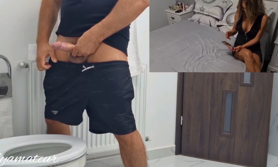 While I was cumming in the toilet, my stepmother saw on the phone what I was jerking off to!